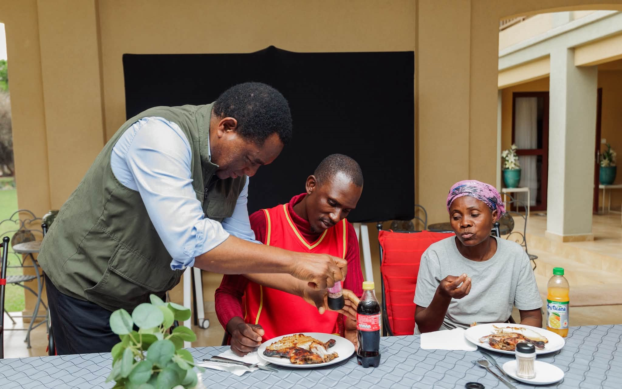 From Village Chicken to a Bicycle Ride: Two Zambians Share a Meal with Hichilema